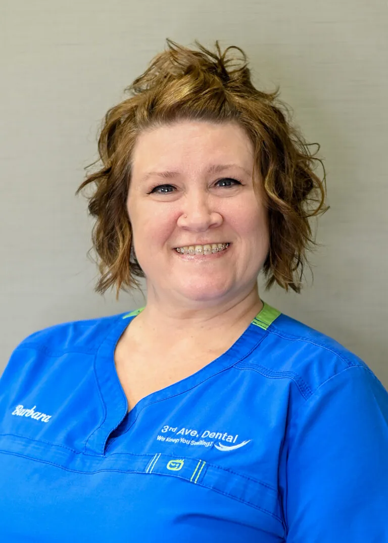 Headshot of Barbara Blevins, RDH wearing a blue scrubs against a plain white background.